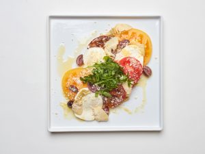 Mozzarella and Sliced Tomatoes with Olives