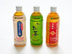 Three bottles of Teas, assorted flavors are displayed, each with a unique colored label on a white background.