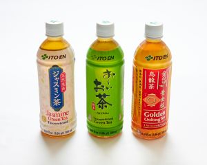 Three bottles of Teas, assorted flavors are displayed, each with a unique colored label on a white background.