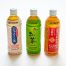 Three bottles of Teas, assorted flavors are displayed, each with a unique colored label on a white background.