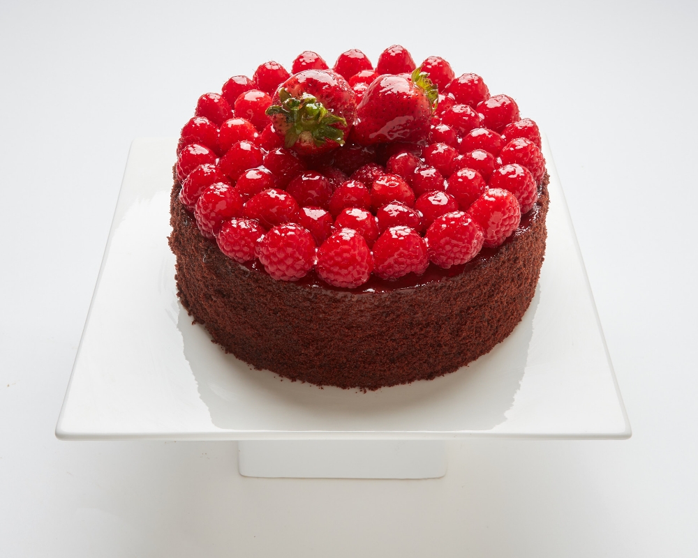 Chocolate Raspberry Truffle cake topped with strawberries in SF